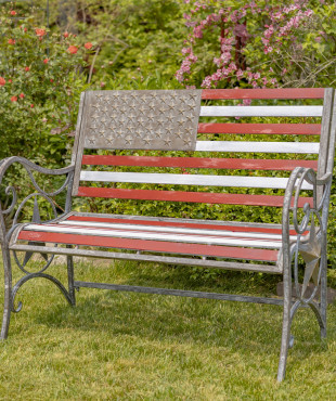 American garden bench with the American colors and a star on both sides of the bench