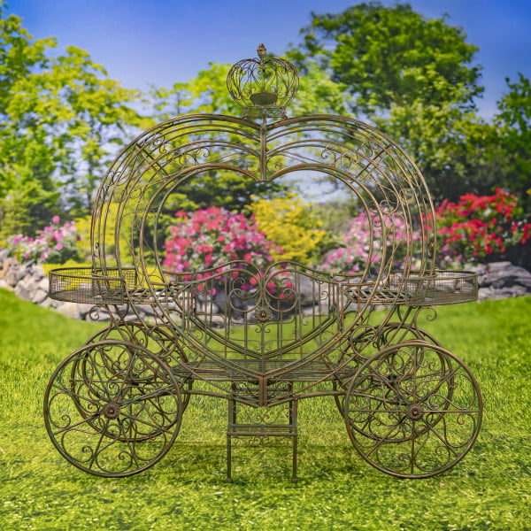 Heart-shaped iron flower carriage on 4 wheels with 2 flower baskets and large crown on top in antique bronze finish with small flowers and filigree details