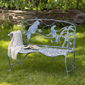 coastal blue metal outdoor bench with parrot and cockatoo backrest