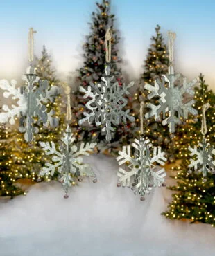 set of 6 galvanized metal folding snowflakes in 6 assorted shapes and sizes with bells hanging on a rope