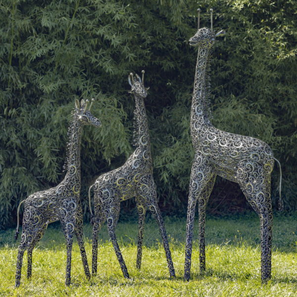Full View of All Three Metal Giraffe's in different sizes with Unique Details