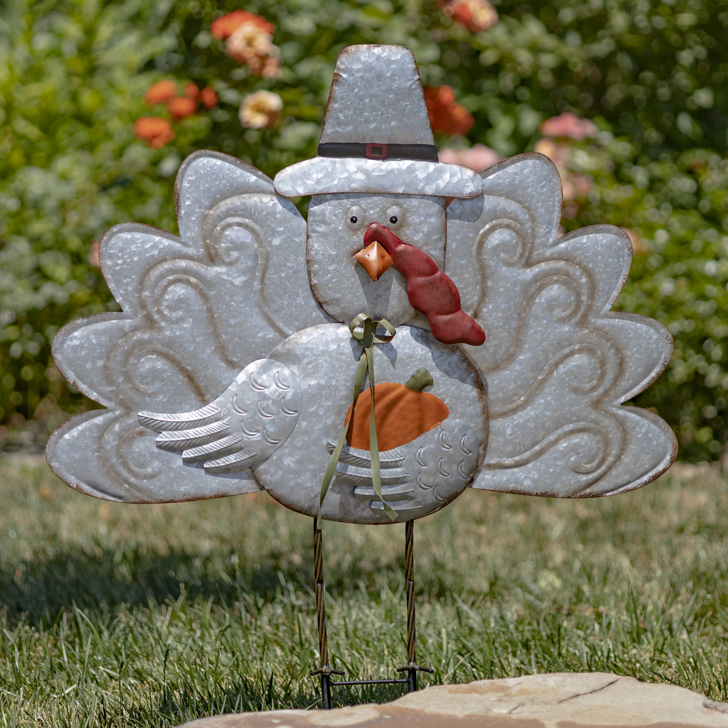 Galvanize flat thanksgiving turkey stake holding orange pumpkin