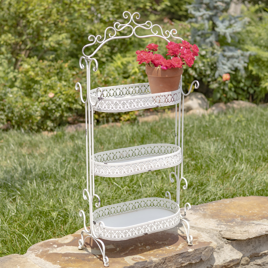 Full image of the Antique White three tier Plant Stand with curlicue designs at the top, sides and bottom of the item