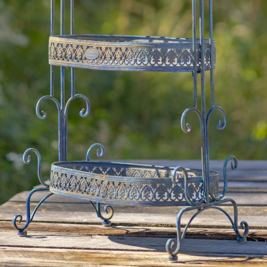 Close up image of the bottom of the Antique Blue Plant Stand showing you the detailed design around ever tier