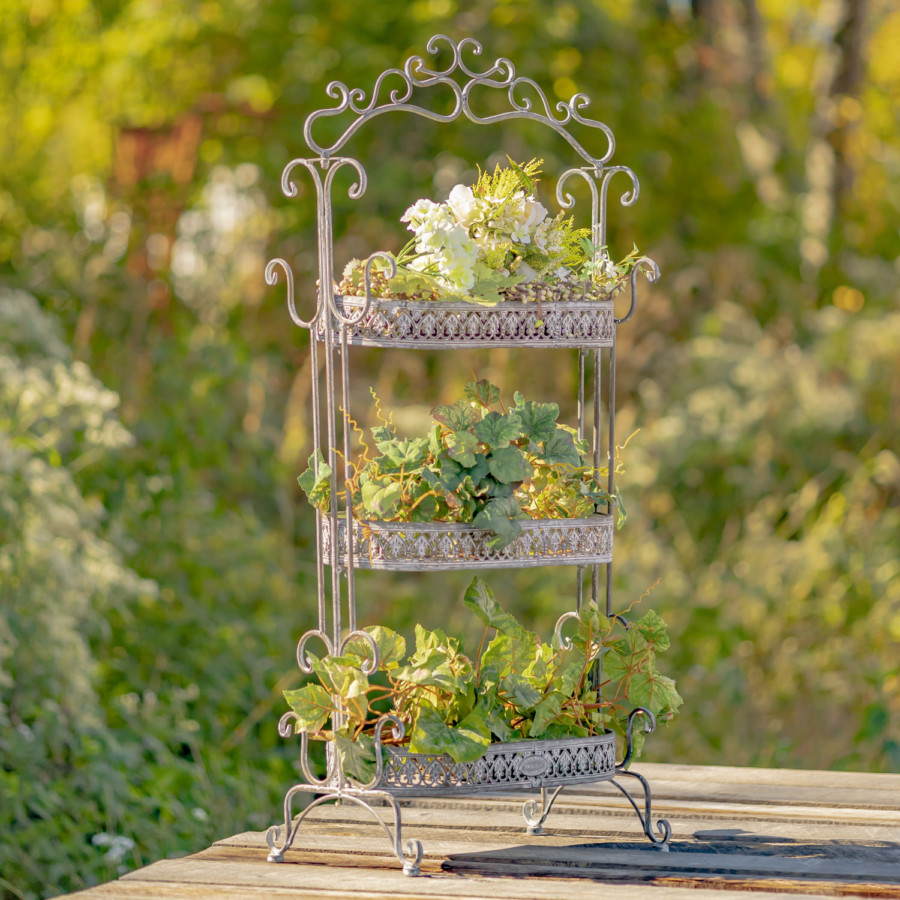 Full image of the Antique Grey three tier Plant Stand with curlicue designs at the top, sides and bottom of the item