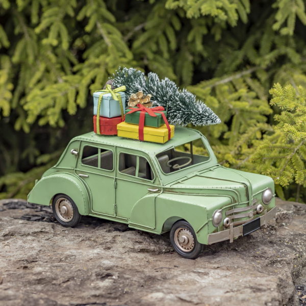 Antique Distressed Finish Car with with Christm as Tree and Gifts on the Rooftop