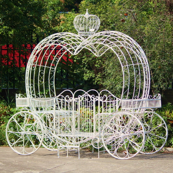 side view image of 10 feet tall large iron heart-shaped carriage with planters, benches and little gates on both sides with a crown on top in antique white finish
