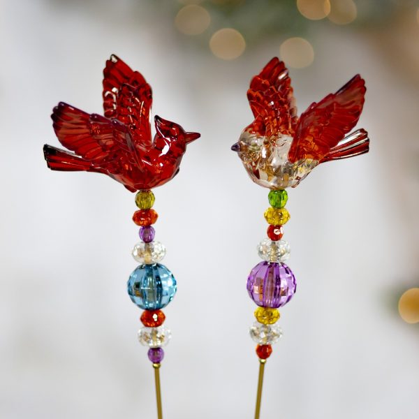 Two Birds Sitting on a Stick with Pink and Blue Beads