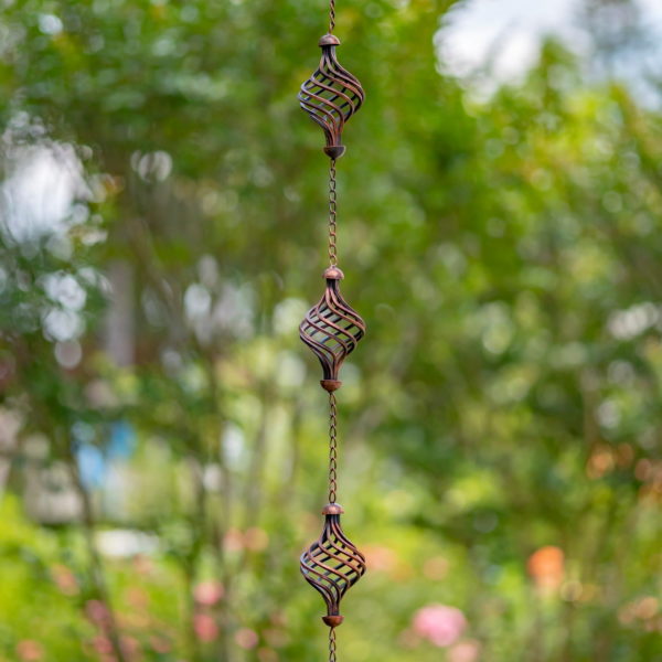 Metal Swirls Hanging on a Chain