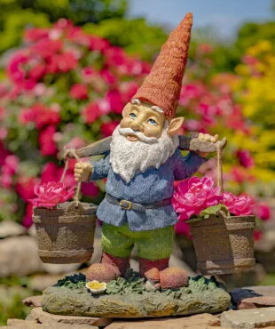 21 Inch tall spring garden gnome holding two buckets with pink flowers