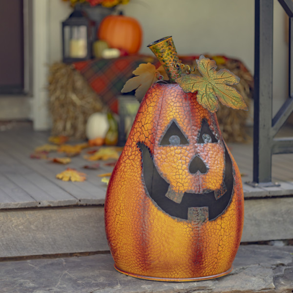 Full image view Large Metal Lantern in the shape of a pumpkin that is a candleholder