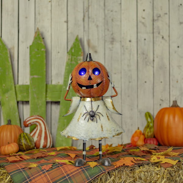 Halloween pumpkin head figurine with hands on head, LED lights eyes in white dress with spider