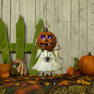 LED Pumpkin Girl in a White Dress with a Spider on it