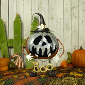 Witchy Pumpkin with silver face and it has a BOO sign on it