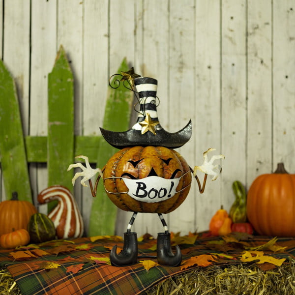 iron Halloween jack-o-lantern pumpkin figurine in top hat with face mask boo in black boots
