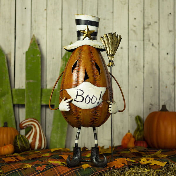 iron Halloween Jack-O-Lantern pumpkin figurine with face mask boo in striped top hat holding broom