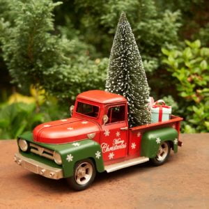Red and Green Christmas Pick Up Truck with a Christmas Tree and Gifts in the back and it has snow flakes on it as well