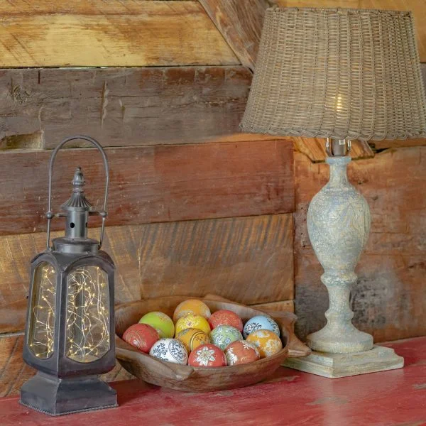 Round Bowl with With Floral Pattern Sailor Balls in between a Lamp and a Lantern