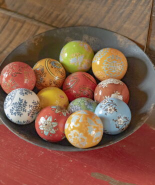 Twelve Ceramic Fisherman Balls in a Bowl