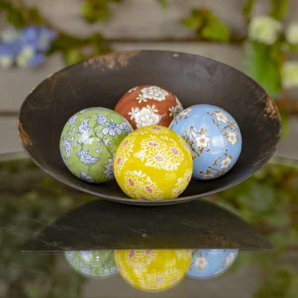 Four Ceramic Multi Colored Balls decorated in floral Japanese Designs in a bowl ( Bowl not included)