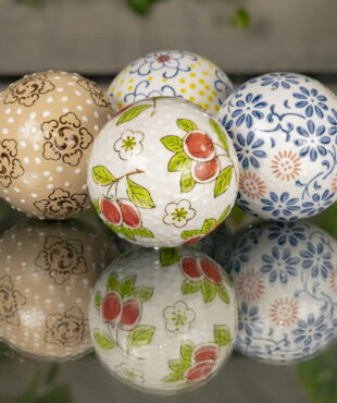 Four Multi Colored Balls with floral Japanese designs