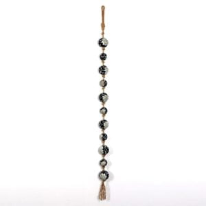 Small Black and White Ceramic Sailor Balls Hanging on a Garland of Rustic-Style Rope