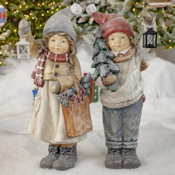 A Girl and Boy- Holding Lanterns, Shoping Bag, and Christmas Trees-Dressed in Winter Clothing