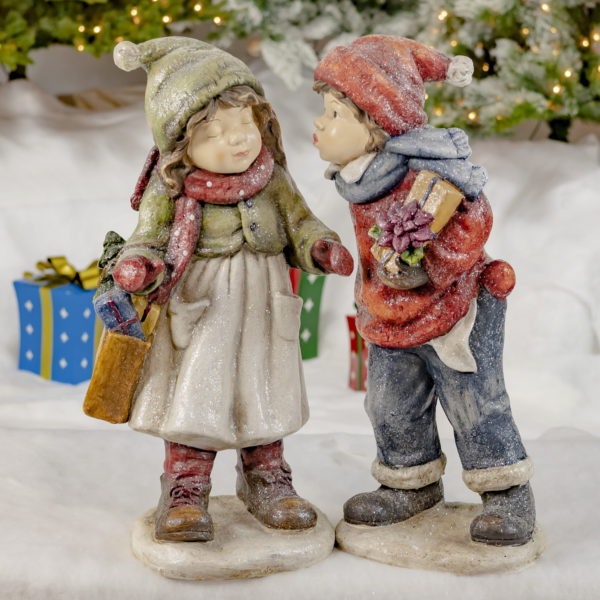 Little Boy and Girl Sharing Their First Kiss- Holding Gifts- Weaing Red and Green Hats, Scarves and Gloves