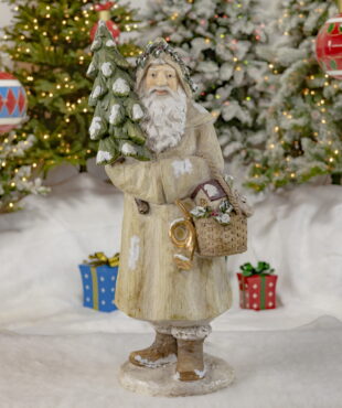 Full View of Santa Statue Wearing Grey Coat- Holding a Basket Filled with Gifts and a Christmas Tree