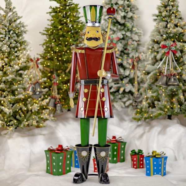 Full View of of Iron Nutcracker Holding Baton- In a Red Suit
