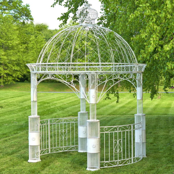 Large round iron garden gazebo Zina in distressed antique white finish features four sturdily built pillars, beautiful side gates, and an ornate dome roof
