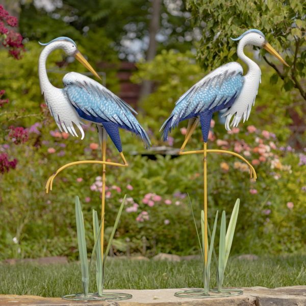 A Pair of Blue and White Metal Herons
