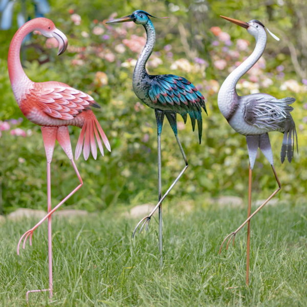 a Trio of Metal Flamingos, Cranes and Herons in assorted colors