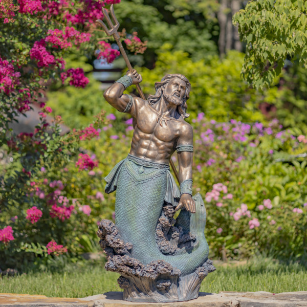 Tall antique bronze merman statue with his muscular body throwing a trident