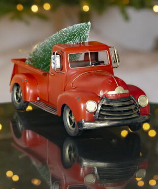 Front view 15 inches iron pickup truck in distressed red finish with removable Christmas tree in trunk