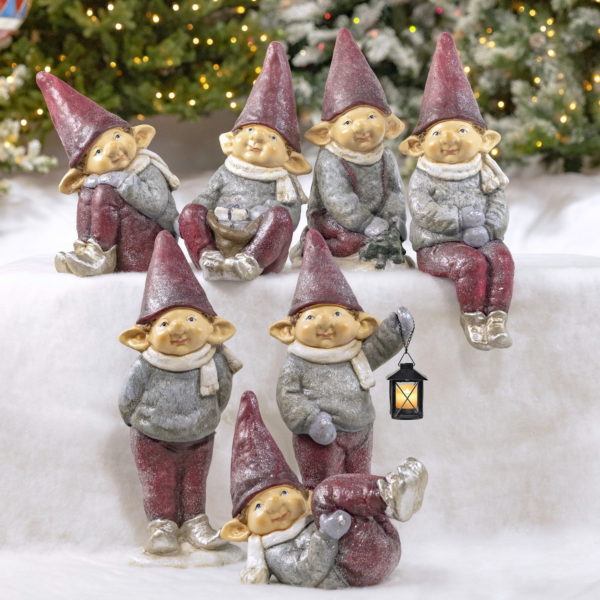 Group of Seven Elves Holding Lanterns, Christmas Trees or surrounded by Gifts