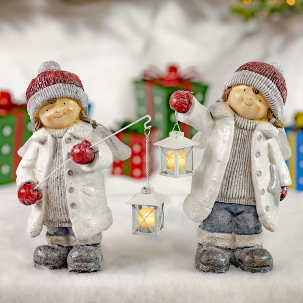 Two Girl Angels Holding Lighted Lanterns- Wearing Winter Jackets and Warm Winter Hats