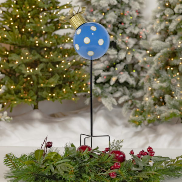 Full View of Big Blue Polka Dot Christmas Ball on a Stake