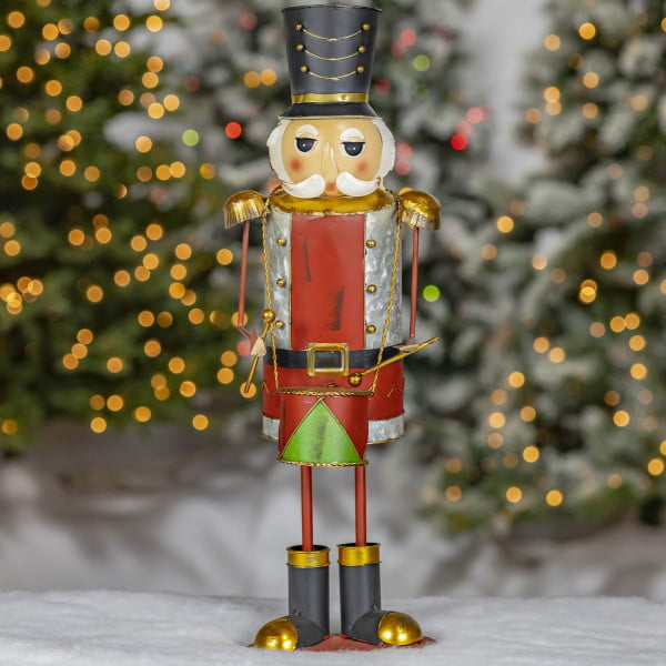 Galvanized metal Christmas nutcracker figurine with drum