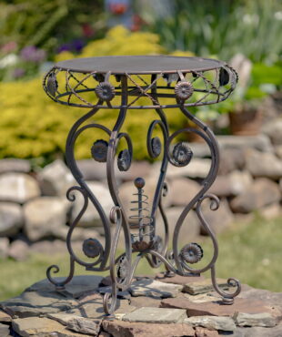 Iron Round Table with Aster flower accents in antique bronze finish