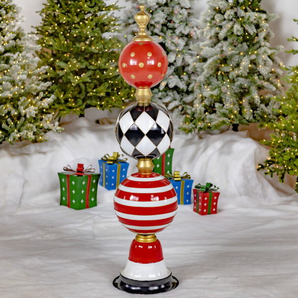 5.6 Feet tall iron Christmas ornament tower with polka dot, strip and argyle patterns in red, white, black and gold