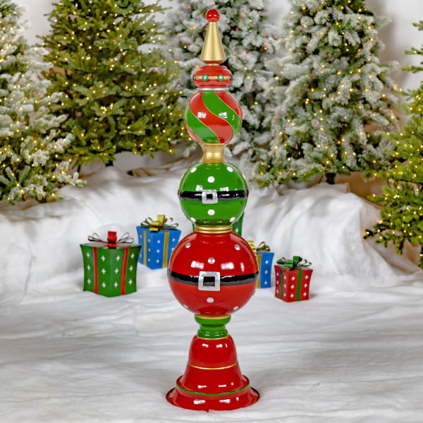 5.5 Feet tall iron Santa Claus inspired Christmas ornament tower with belt buckles and swirl pattern in green, red and gold