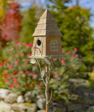 Iron haystack cabin birdhouse in antique copper finish with patina details