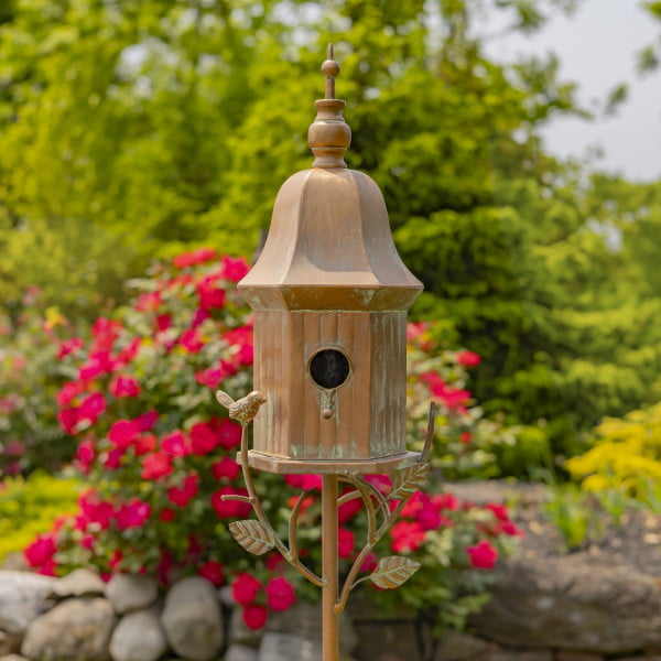 front view image of iron birdhouse stake in antique copper hand-painted distressed finish with patina details with bell roof and little bird perched on decorative leaf