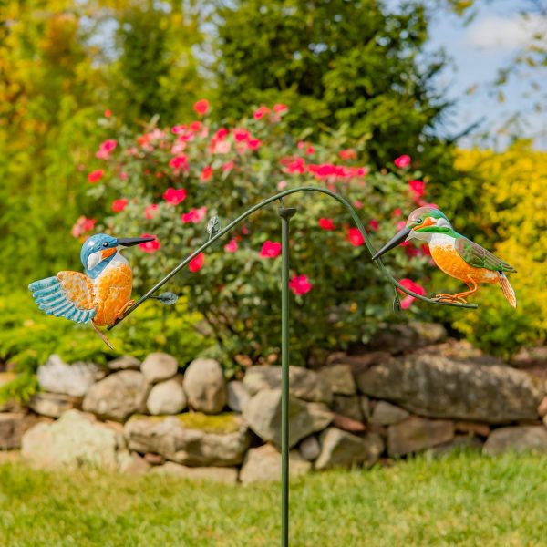 closed up image of decorative iron garden balance stake with two painted birds on opposite sides