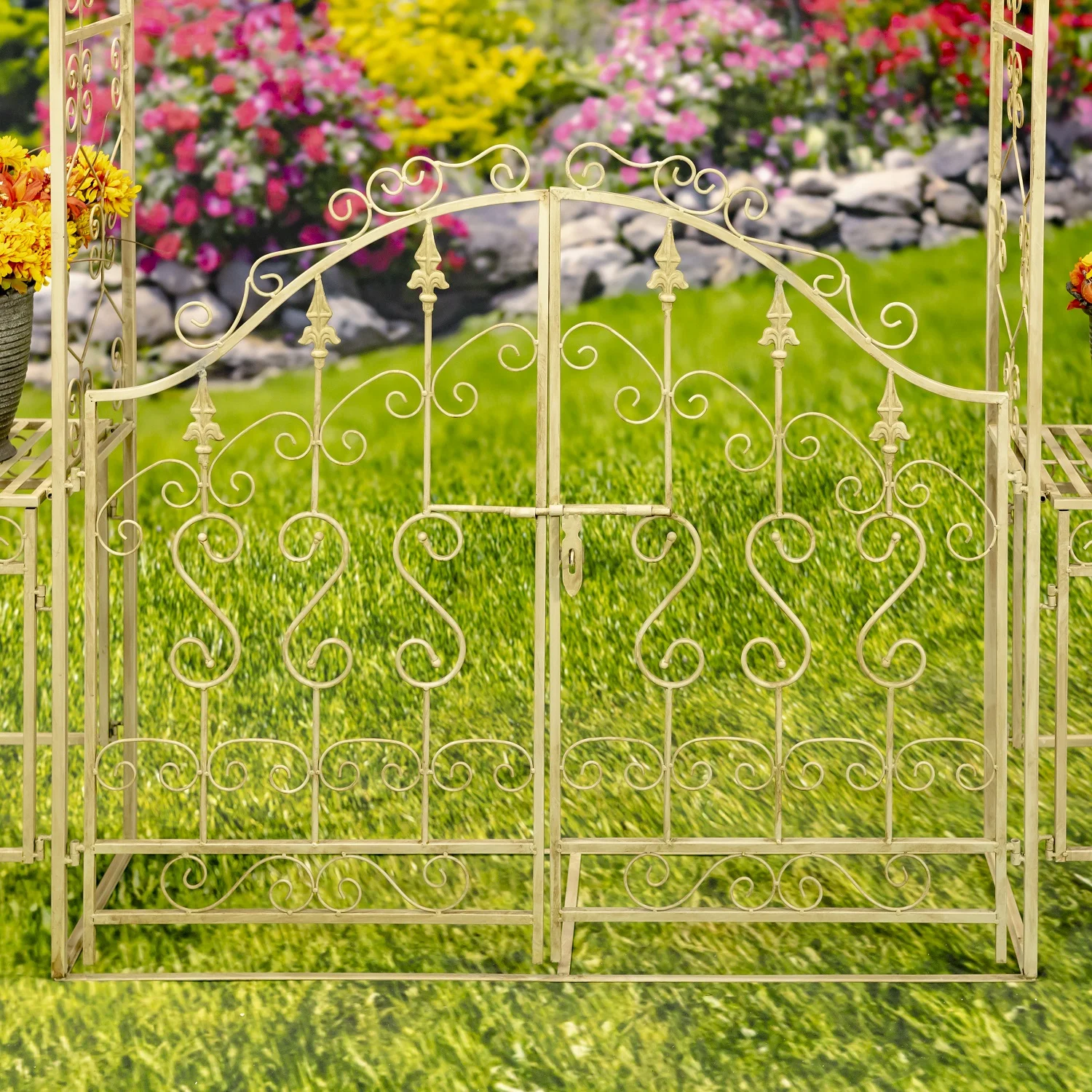 closed up image of Iron Garden gate with latch in distressed antique white finish