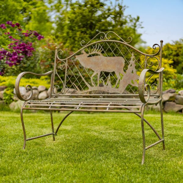 classic style iron garden bench with moose and evergreen on a backrest, curved armrest and seating in distressed reddish-green finish