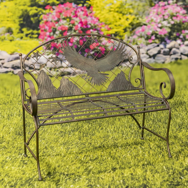 classic garden iron bench with round top backrest with flying eagle and mountain silhouette in distressed antique bronze finish
