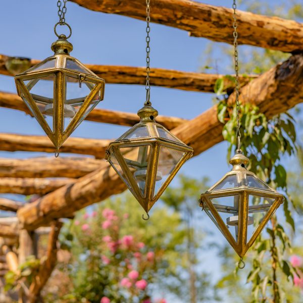 3 hanging iron diamond-shaped lanterns in frosted gold finish with tea-light candleholder