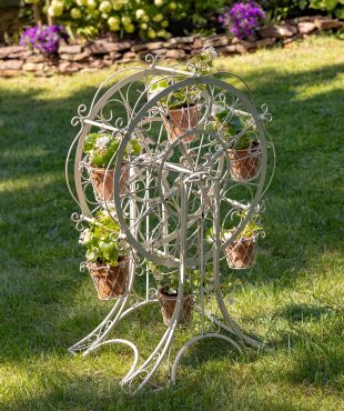 38 inches tall iron ferris wheel plant stand with 6 flower pots in distressed antique white finish in garden